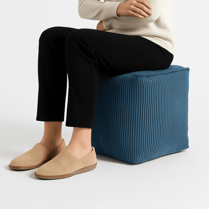Utilisation du pouf carré comme repose-pieds